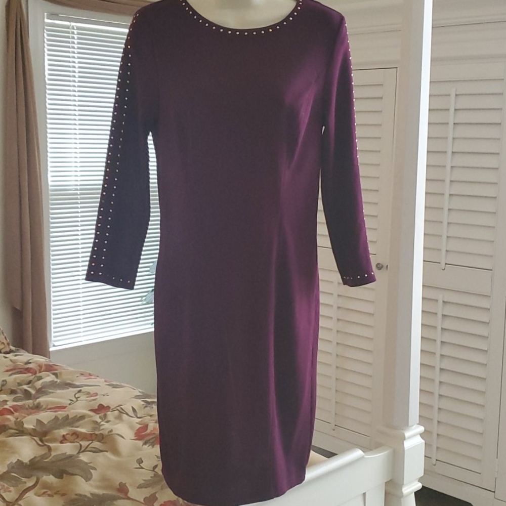 Deep purple long sleeve form fitting mini dress